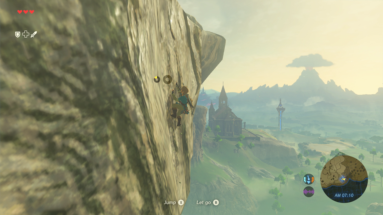 Link standing on a cliff overlooking the vast landscape of Hyrule in Breath of the Wild