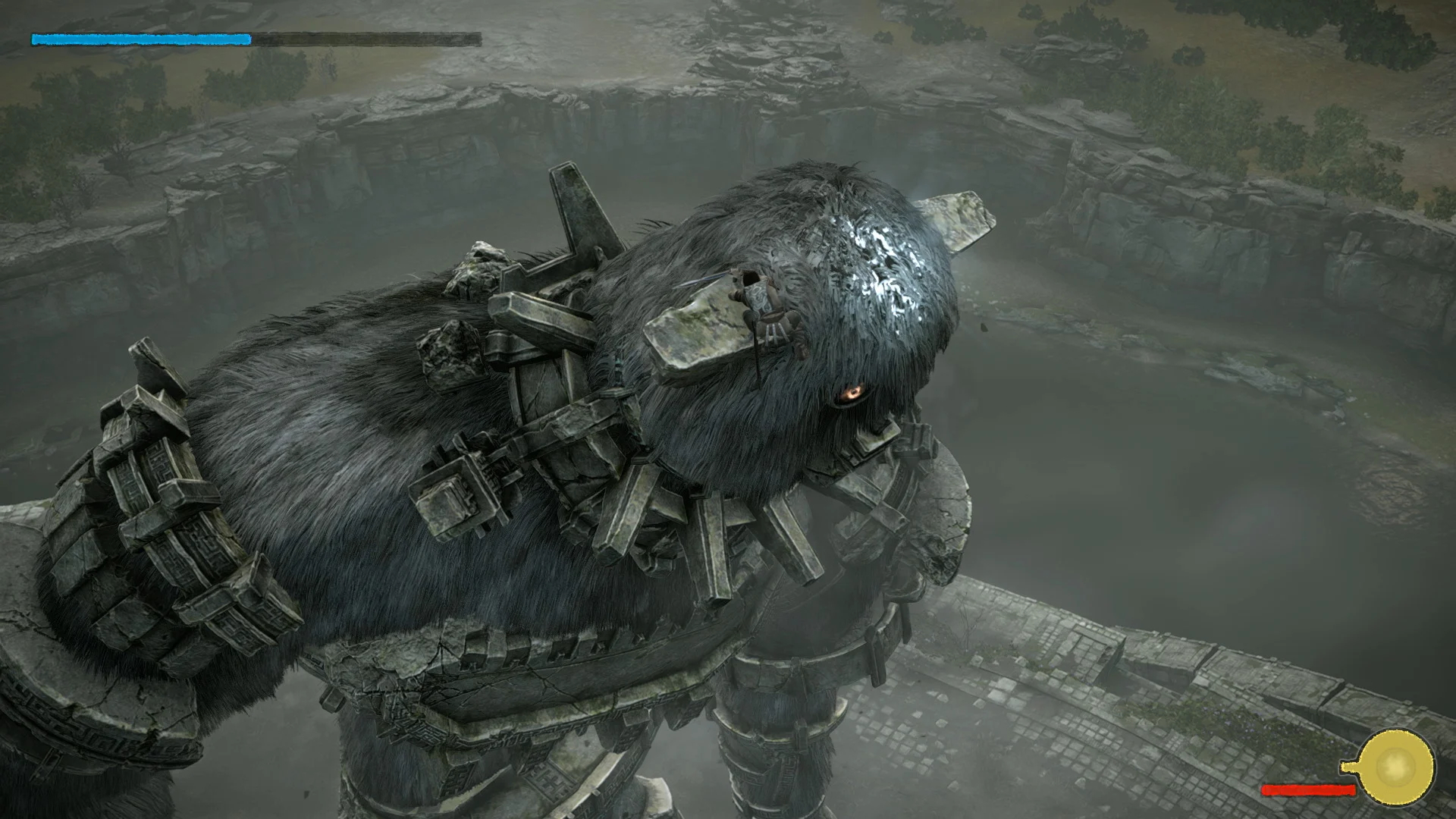 Wander on horseback approaching a colossus amid towering stone pillars in Shadow of the Colossus